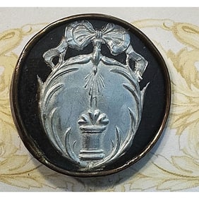 A rare division one under glass button