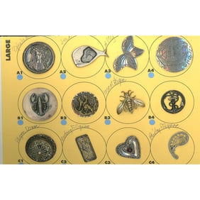 A partial card of division 1 & 3 metal buttons