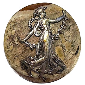 A division one shell button with pictorial escutcheon