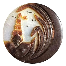 A division one carved pearl sailing scene