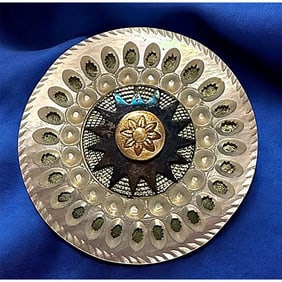 A division one steel and pearl button