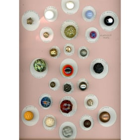 A card of division one and three assorted ball buttons