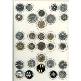 A card of division one and three black glass buttons