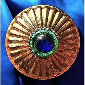 A division one glass set in metal button