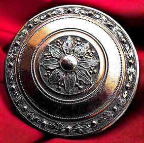 A RARE division one ornate copper button