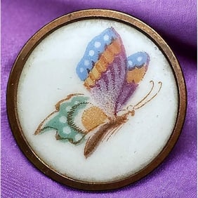 A division one transfer on porcelain button