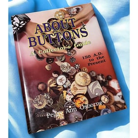 A large book about buttons