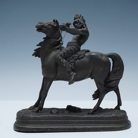 Cast Metal Sculpture of a Native American Warrior on Horseback