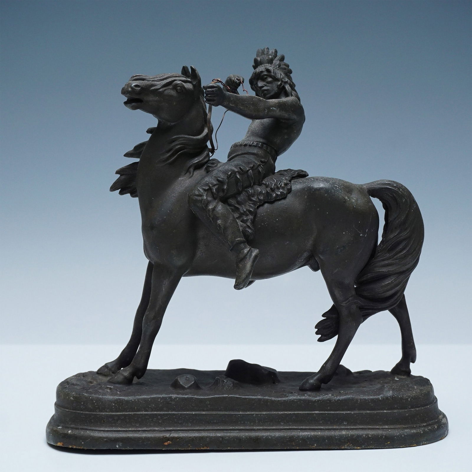 Cast Metal Sculpture of a Native American Warrior on Horseback (1 of 4)