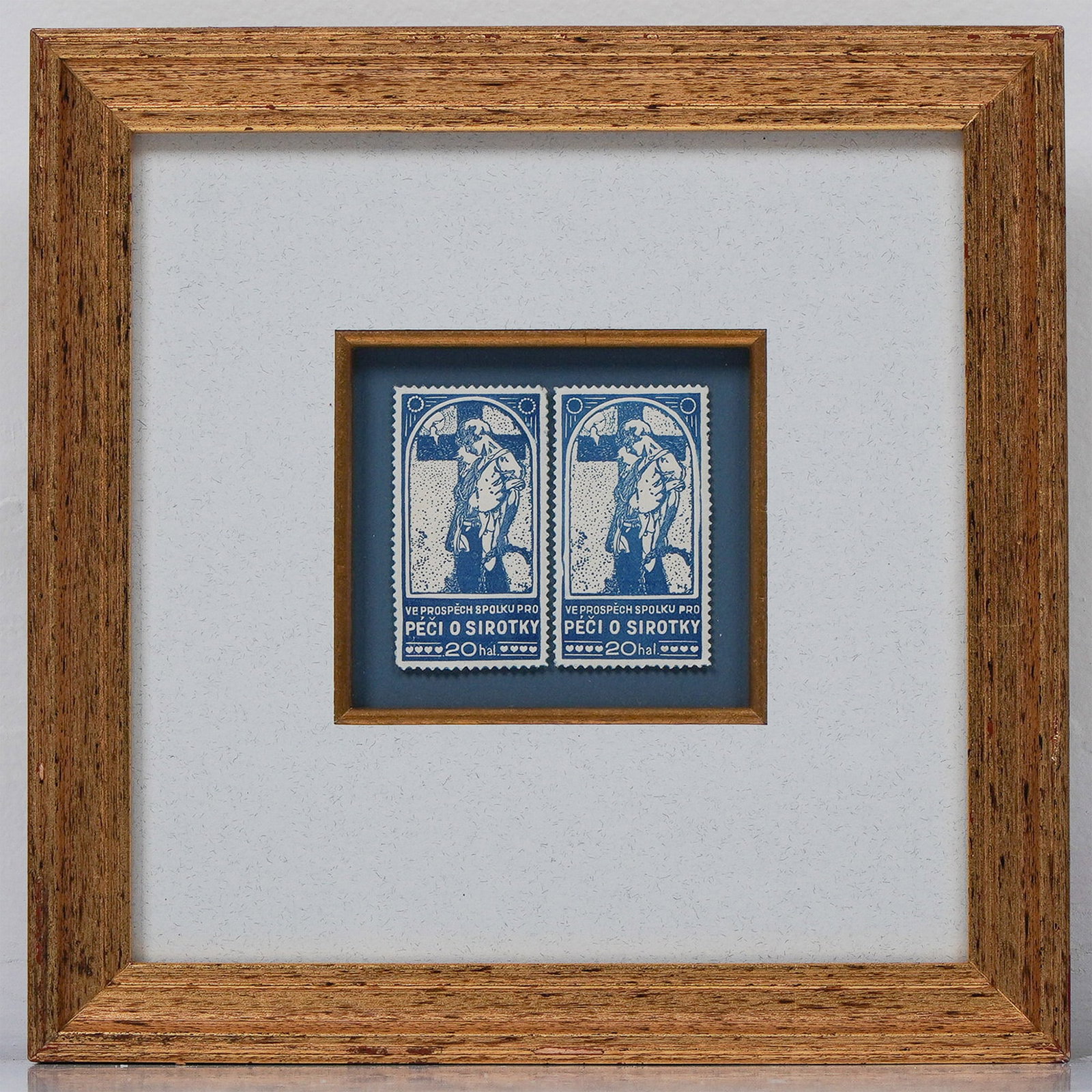Czechoslovakian Charity Stamps: A pair of vintage Czech charity stamps inscribed "Care for the Orphans," circa 1920. These blue stamps, marked "Ve Prospech Spolku Pro Peci O Sirotky" (translated as "For the Benefit of the Society fo