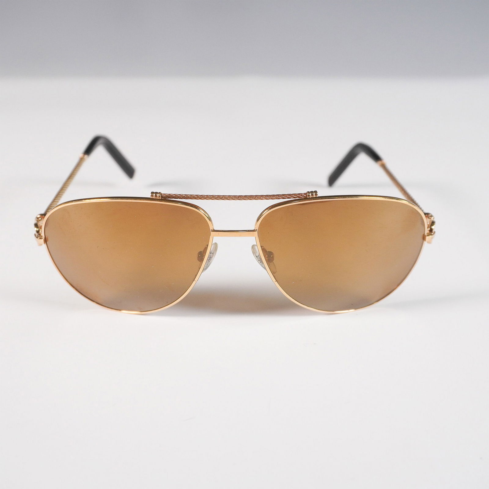 Fred Force 10 Gold Aviator Sunglasses: Fred Paris Force 10 aviator sunglasses featuring a gold-tone frame, brown lenses, and signature twisted cable temples. Part of the iconic Force 10 collection inspired by nautical cable designs. Marked