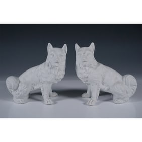 Pair of Bisque Porcelain Dog Figurines