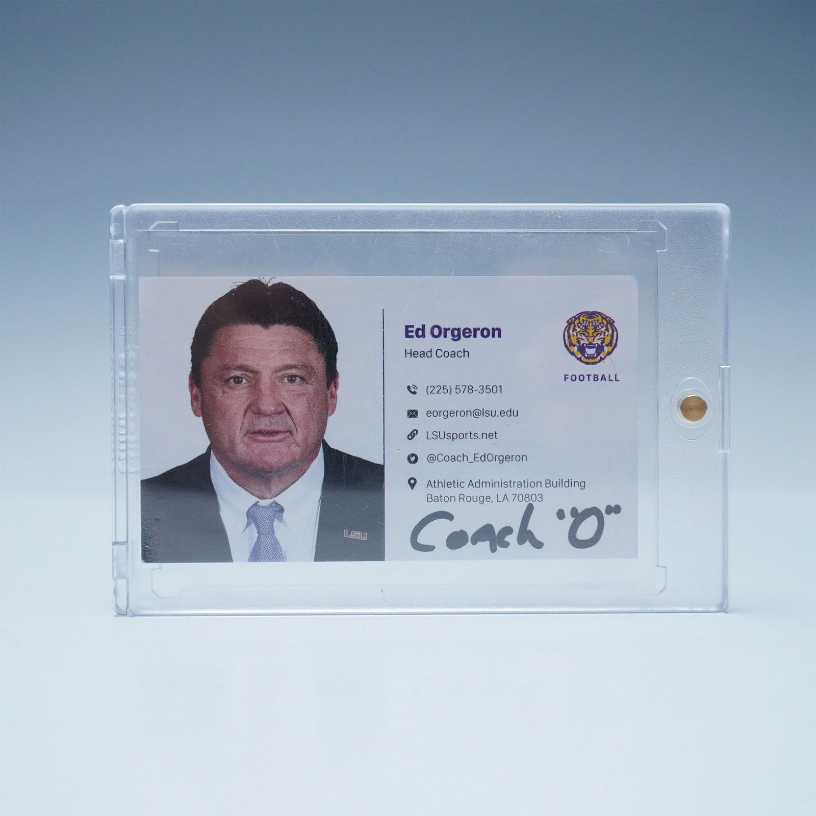 Ed Orgeron Signed LSU Head Coach Business Card: This LSU Tigers business card for Head Coach Ed Orgeron is a unique collectible, featuring his printed contact information and a bold signature reading "Coach O". Orgeron famously led LSU to an undefe