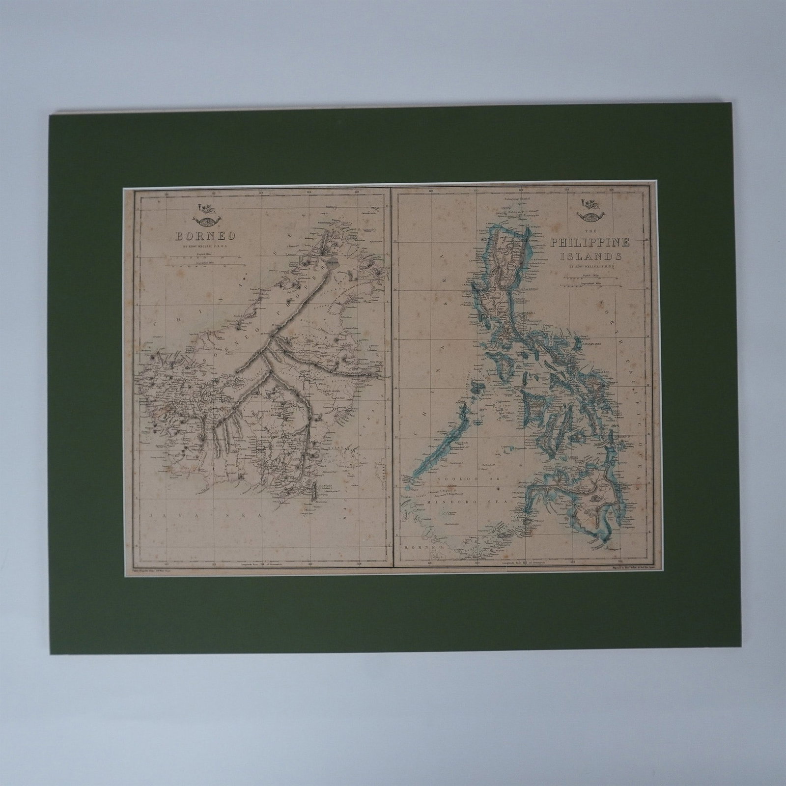 Edward Weller, Antique Maps Borneo & Philippine Islands: Original engravings that features two highly detailed 19th-century maps by the esteemed British cartographer Edward Weller, known for his precision and artistry. These maps reflect the expanding geogr