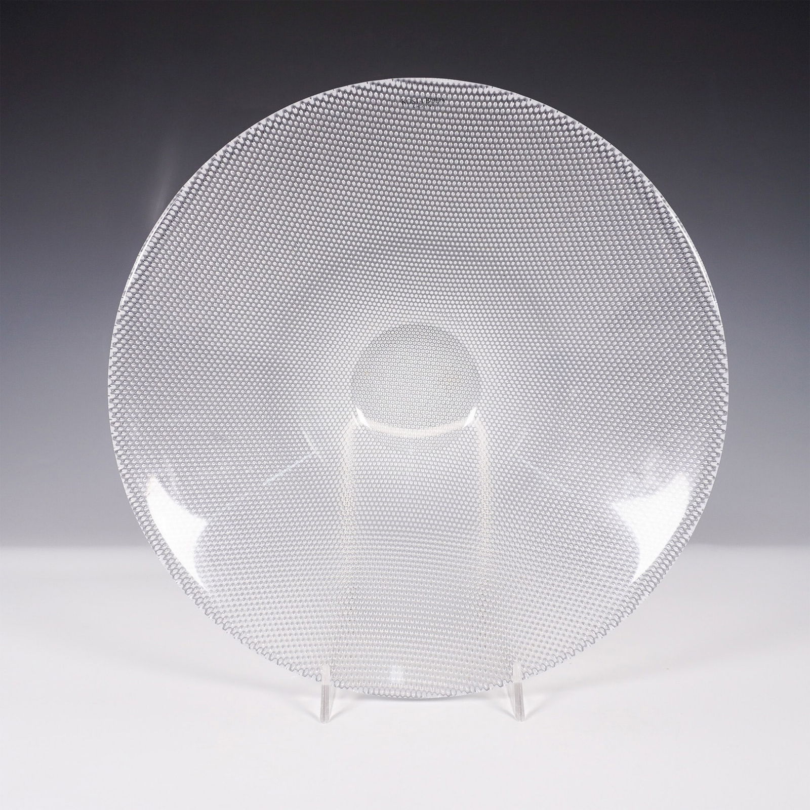 Kosta Boda Limelight Crystal Bowl: Sophisticated Kosta Boda Limelight crystal bowl, designed by acclaimed Swedish glass artist Goran Warff. This striking piece features the signature Limelight textured pattern, meticulously crafted to
