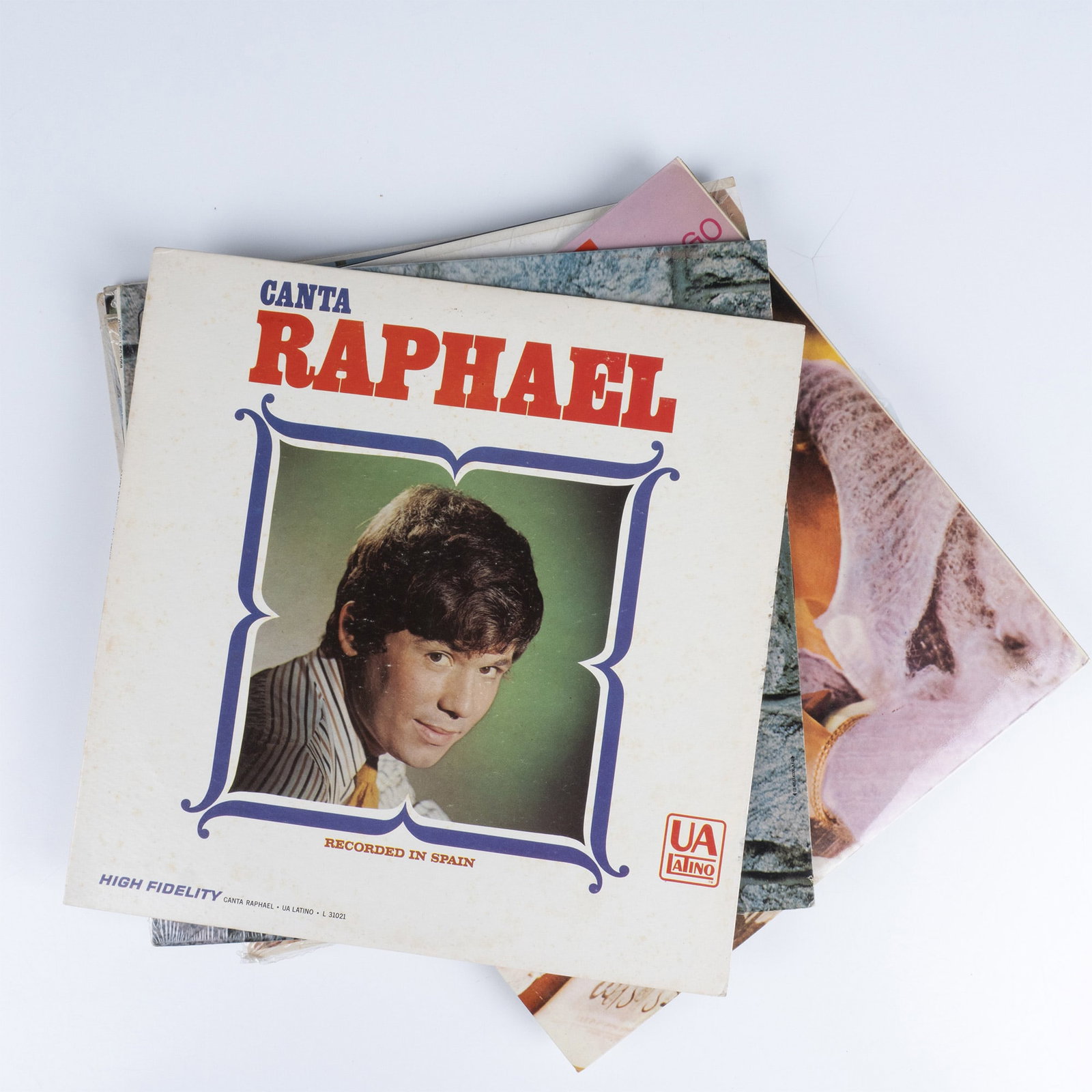 8pc Vintage Vinyl LP Collection of Mixed Music Artist: Includes High Fidelity by Canta Raphael, Los Dos Grandes by Roberto Ledesma, Las Memorias Estan Hechas De Algo by Ray Conniff y sus coros, Cuentos Picante by Rosendo Rosell, Adoro by Roberto Ledsma, E