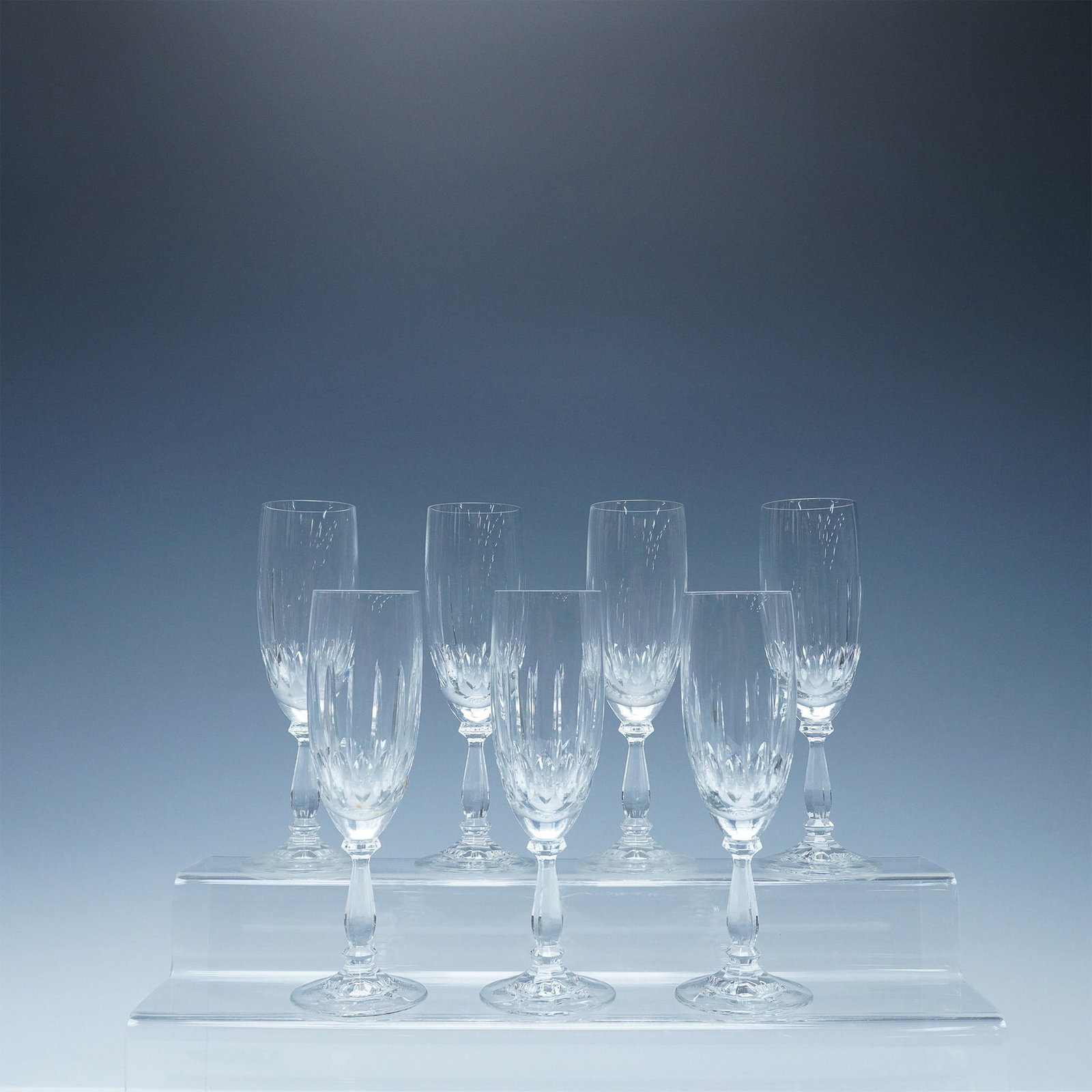 8pc Vintage Cut Crystal Wine Glasses: A set of eight finely crafted cut crystal wine glasses featuring a faceted design that enhances light refraction for a brilliant display. Each glass showcases a vertical cut pattern along the bowl, a 