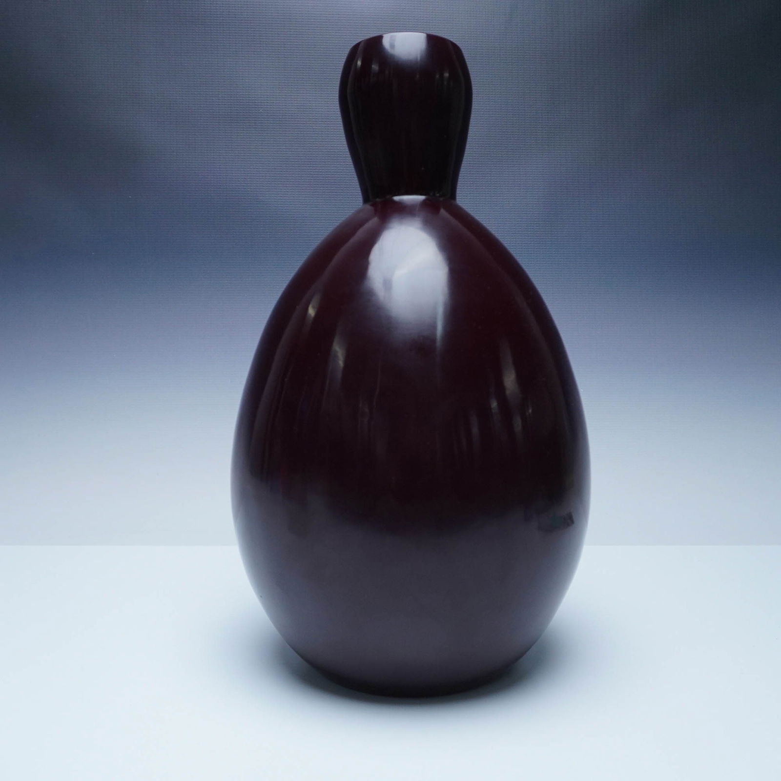 Robert Kuo Peking Glass Vase, Deep Plum Hue: This striking Peking glass vase by Robert Kuo features a rich deep plum hue with a smooth, high-gloss finish. Crafted in the traditional Peking glass technique, the piece exhibits a refined, opaque qu