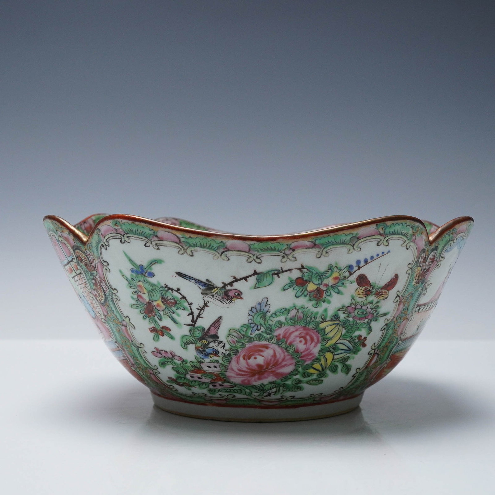 Chinese Rose Medallion Porcelain Bowl : Chinese Rose Medallion porcelain bowl featuring hand-painted figural scenes, floral sprays, butterflies, and birds in vibrant enamels. The exterior is elaborately decorated with alternating reserves o
