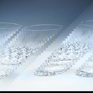 Pair of Waterford Crystal Lismore Double Old Fashioned Glasses: A pair of exquisite Lismore Waterford crystal double old fashioned glasses featuring the brand's signature deep wedge and cross-cut pattern, elegantly faceted for enhanced brilliance. The glasses disp