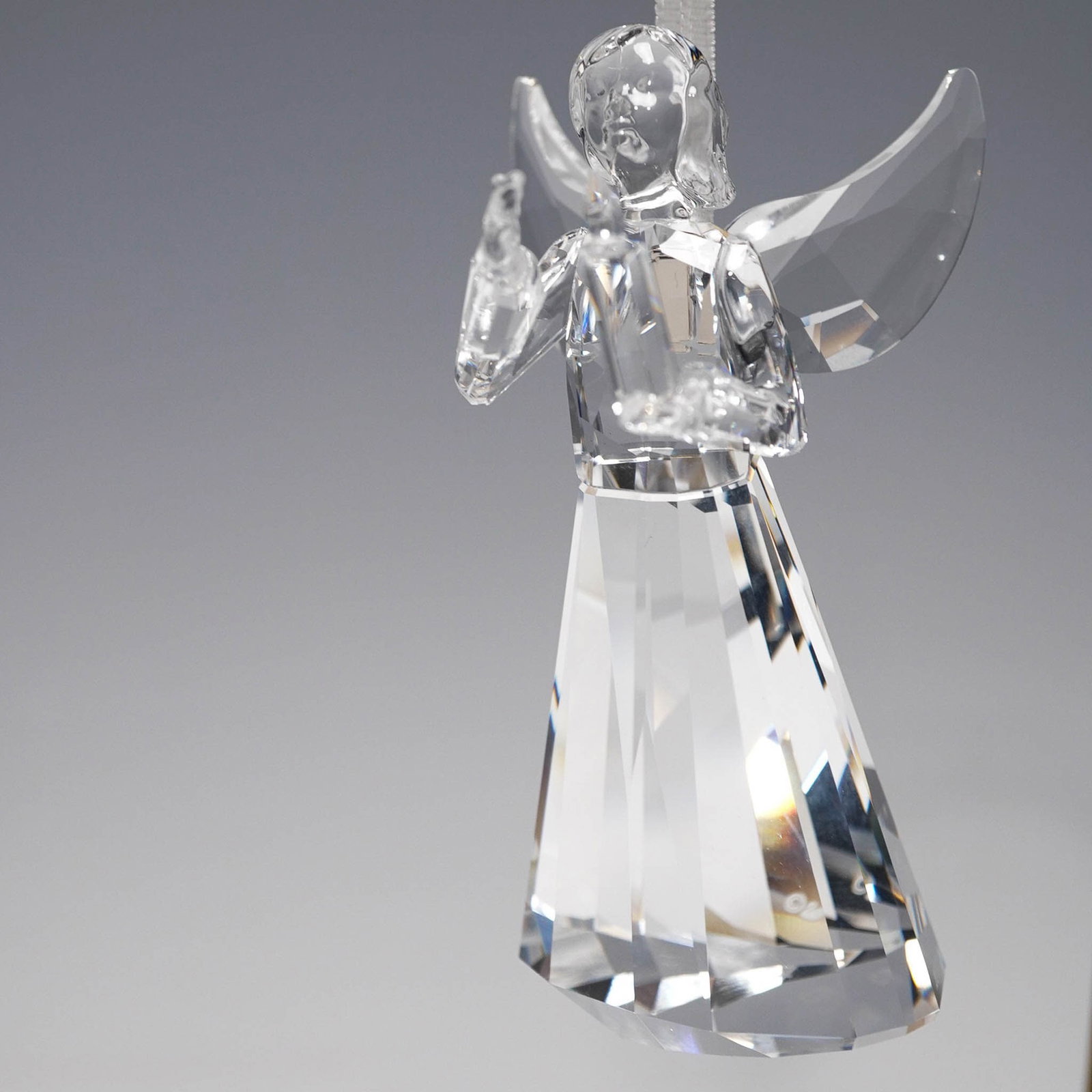 Swarovski Crystal Tree Ornament, Angel 2017: Shimmering 2017 annual crystal ornament celebrates the festive season with a symbol of peace, harmony , and tranquility . Sparkling with 316 stunning clear crystal facets, the Angel Ornament comes on 