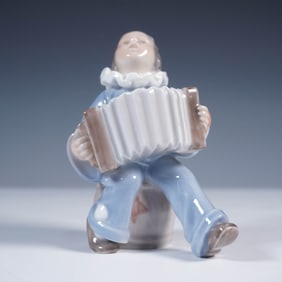 Royal Copenhagen Porcelain Figurine, Boy Clown with Accordion