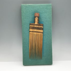 Hand Carved Wooden Comb on Wall Plaque