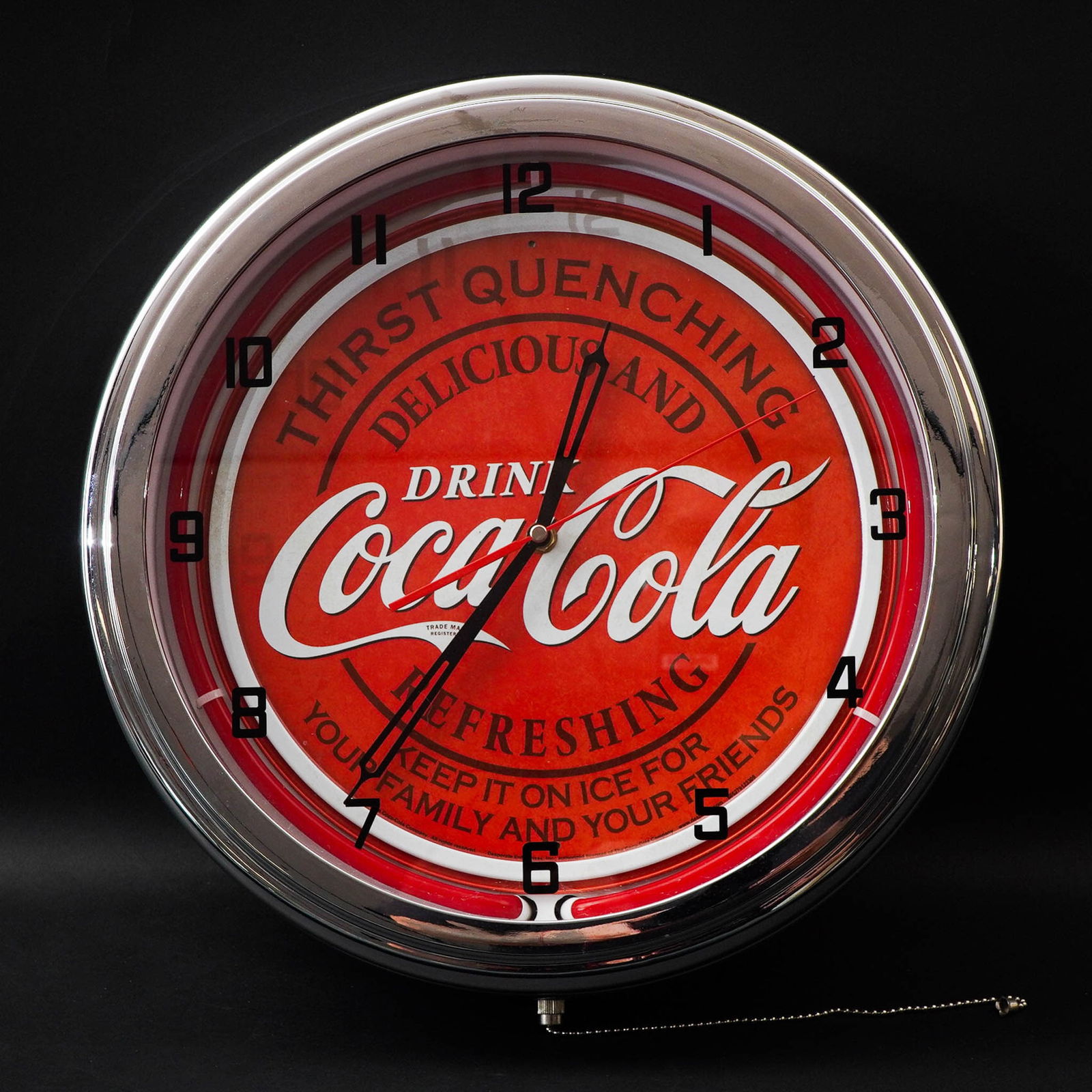 Coca-Cola Wall Clock: Vintage-style Coca-Cola advertising wall clock produced by ManCaveClocks.com. Features the classic red and white "Drink Coca-Cola" logo with the slogans "Thirst Quenching," "Delicious and Refreshing,"