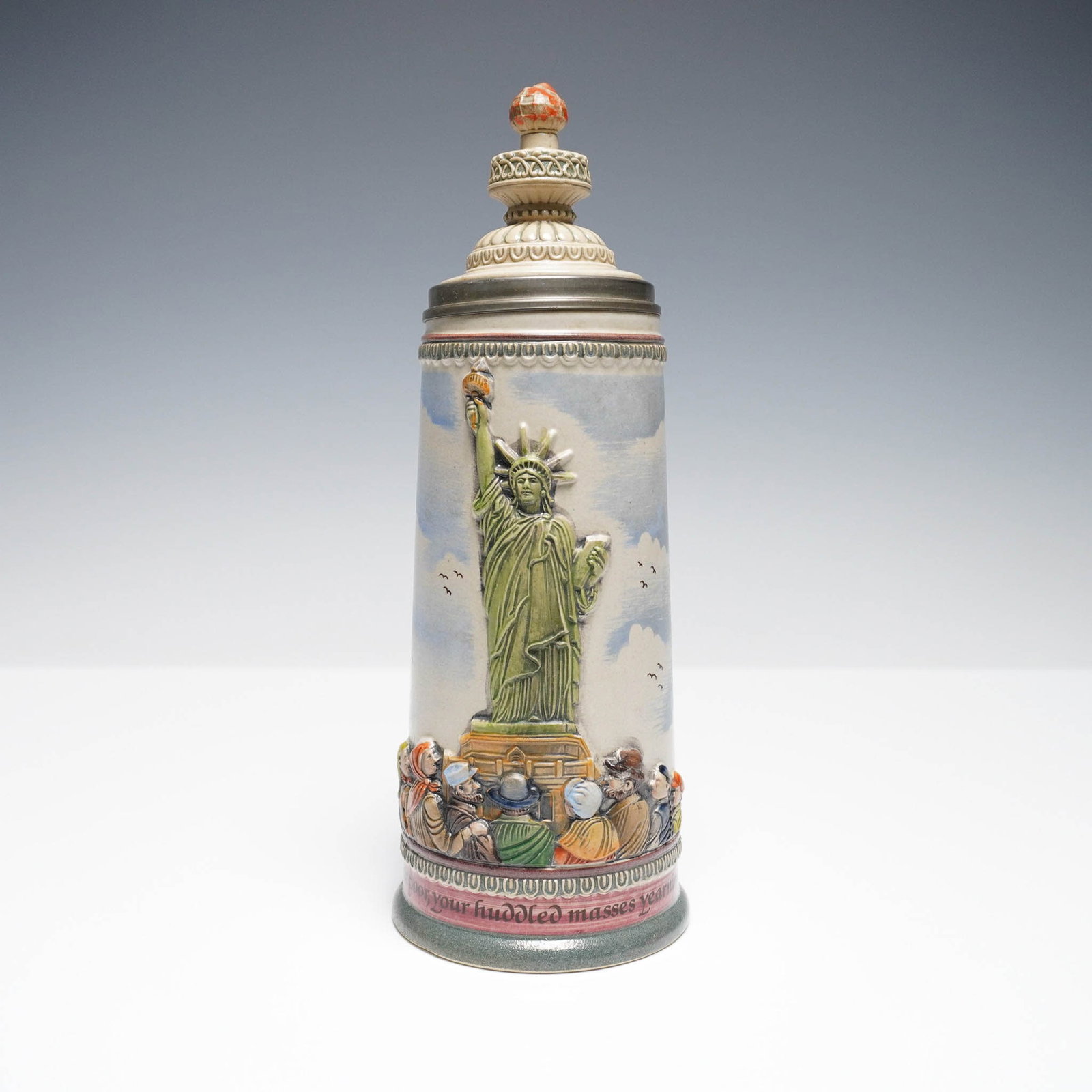 Gerz Statue of Liberty Stein, 100th Anniversary Edition: Limited edition German beer stein commemorating the 100th anniversary of the Statue of Liberty (1886-1986). This stein features a high relief design of the Statue of Liberty and a crowd of immigrants,