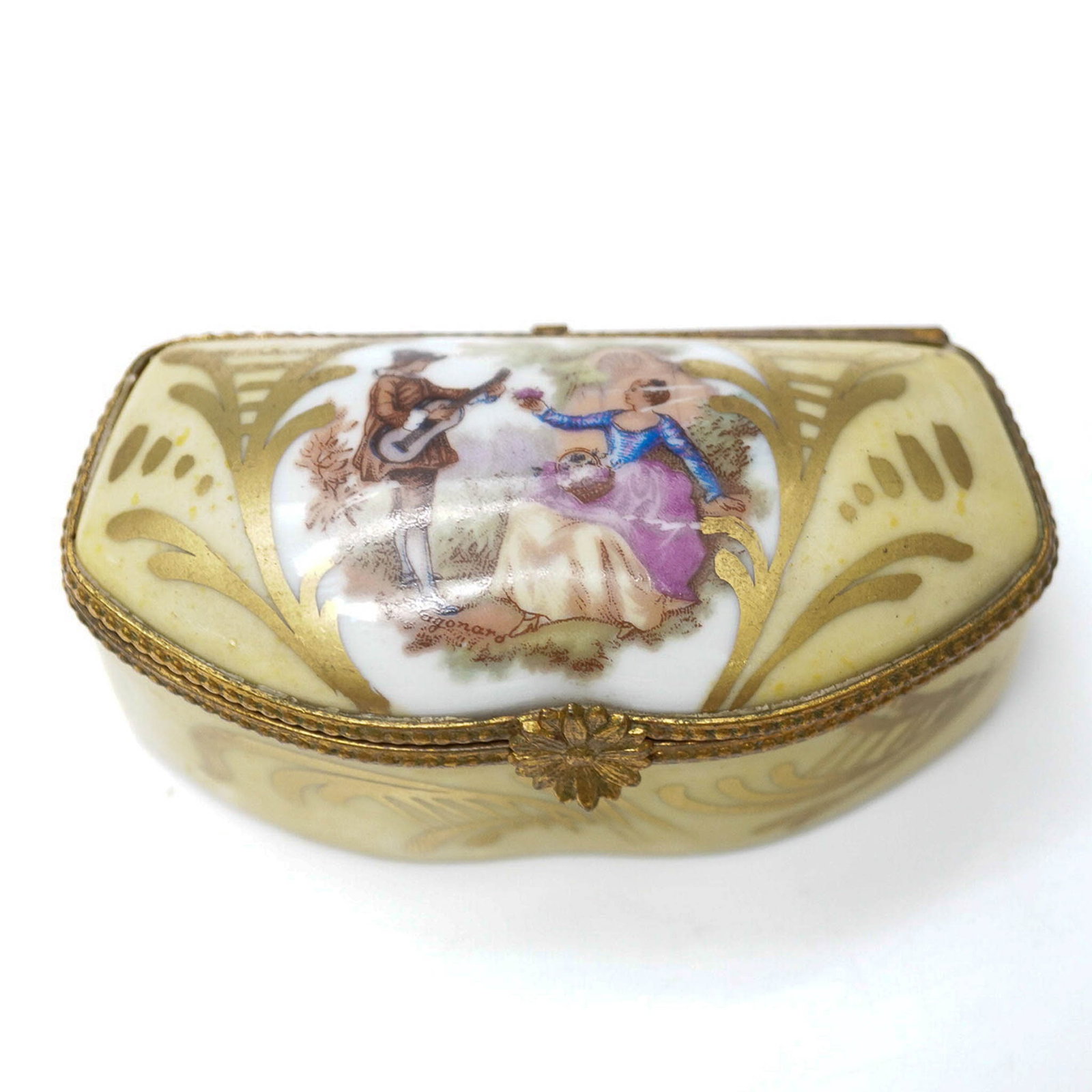 Limoges Porcelain Trinket Box, Courting Scene with Gilded Accents: Charming hand-painted Limoges porcelain trinket box from France, featuring an 18th-century-style courting scene on the domed lid. Surrounded by ornate gold scrollwork on a pale yellow background, this
