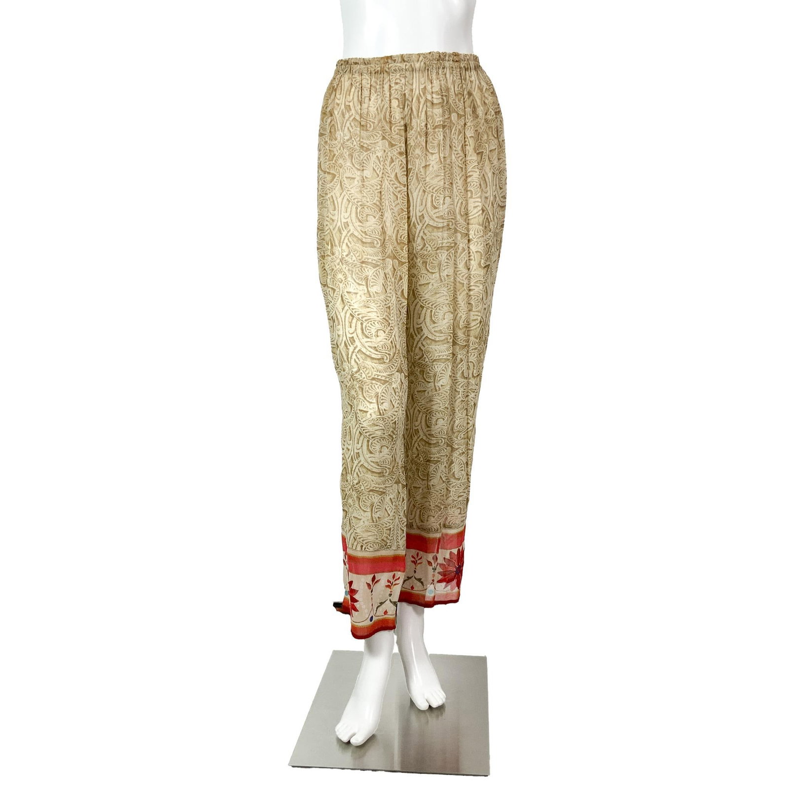 Gottex Sheer Scrollwork Pattern Pant Cover Up: A pair of stylish sheer beach pants featuring a beige scrollwork pattern and decorated with bright red flowers along the hem. Size: M. Waist: 12"W. Inseam: 25"L. Full length: 38.5"L. All measurements