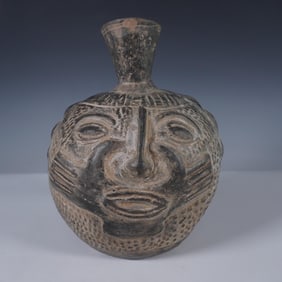 Handcrafted Tribal Face Pottery Vessel