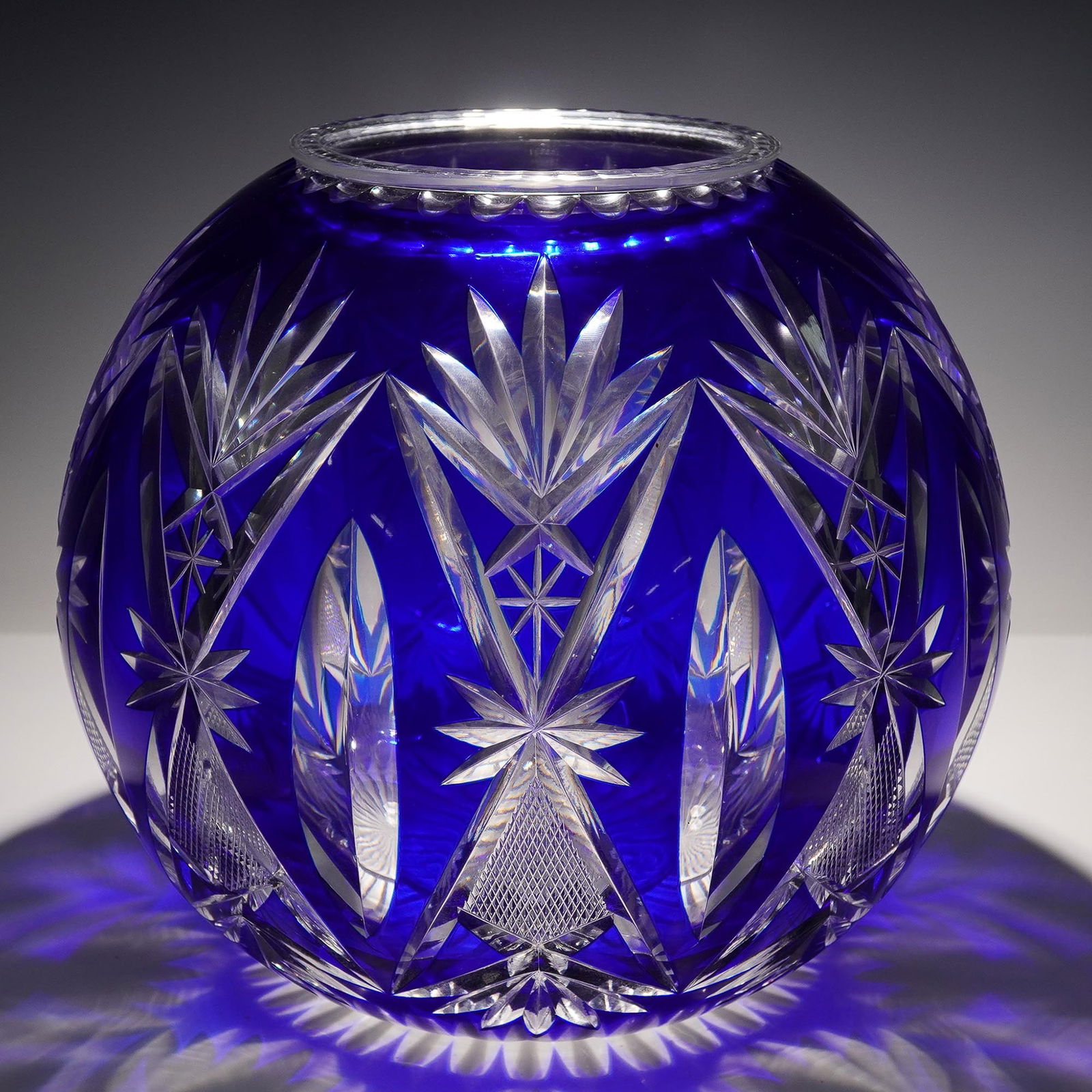 Val Saint Lambert Boule a Fleurs Glass Cobalt Blue with Original Container: Val Saint Lambert cut to clear crystal glass in a striking cobalt blue hue, accompanied by its original container, crafted in 1908. This exquisite piece showcases the meticulous artistry and fine craf