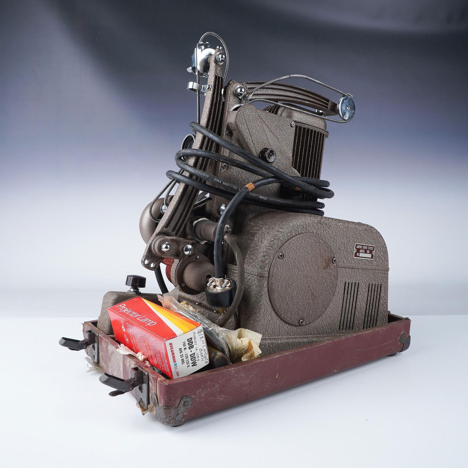 Ampro Super Stylist 8mm Projector with Case: Vintage Ampro Super Stylist Model 508 8mm film projector, manufactured by Graflex Inc. of Rochester, NY. This mid-20th-century device features built-in speaker and phono-mic jacks. Includes its origin