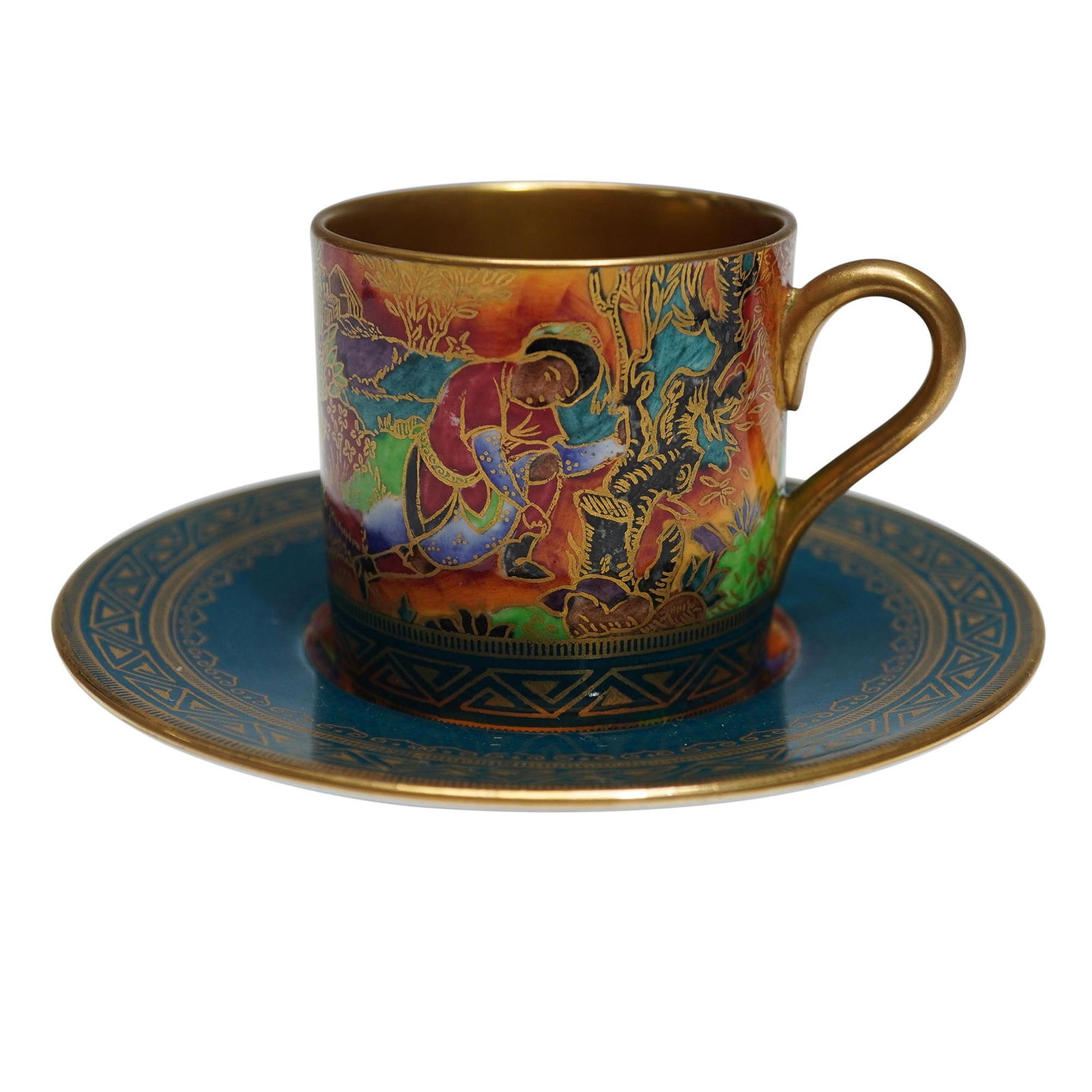 Wedgwood Fairyland Nizami Cup and Saucer: The cup depicts a Persian gentleman kneeling along side a tree stump with white gazelles grazing in the background among colorful foliage. The saucer is decorated with the white gazelles and colorful