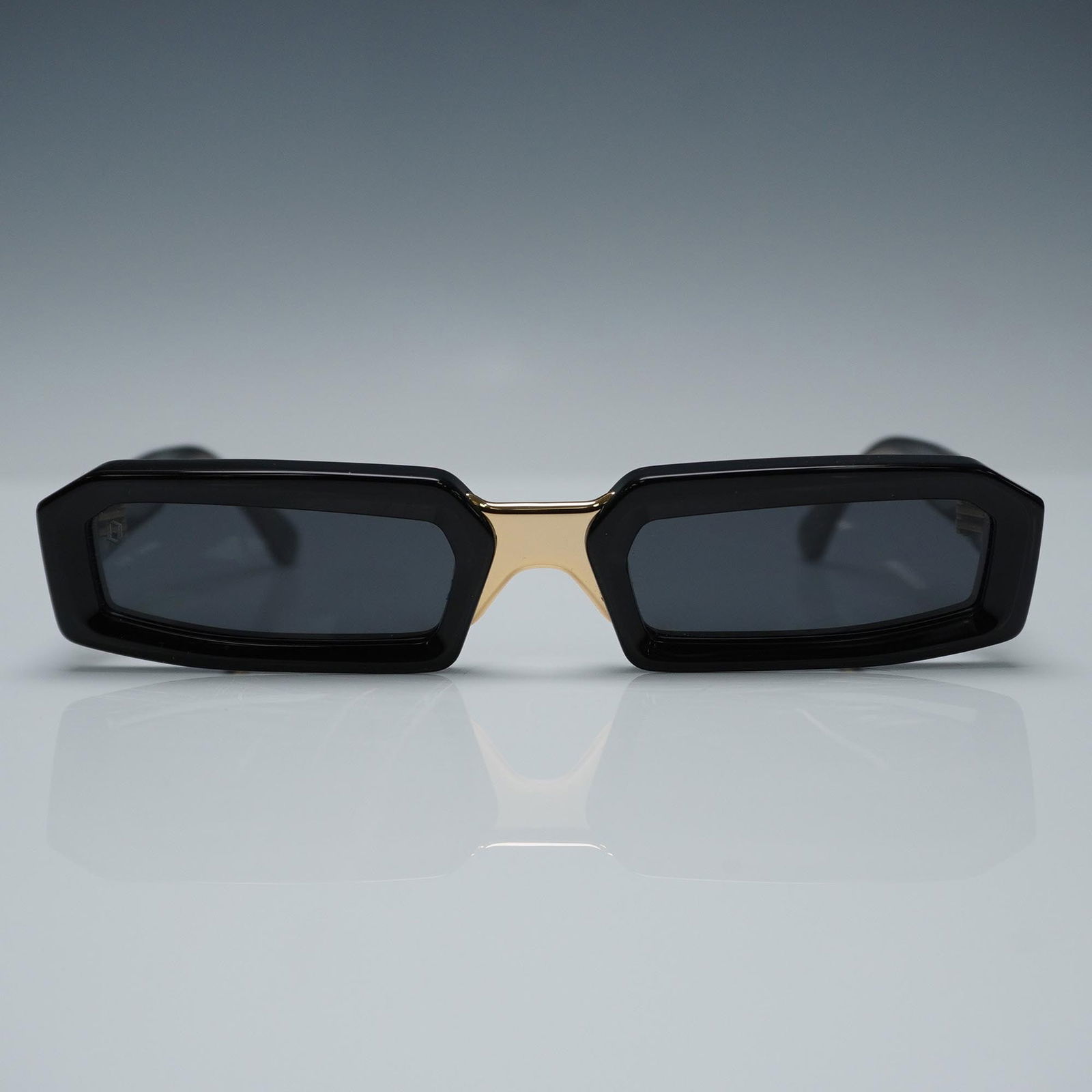 James Oro Sunglasses Ryder, Collection II Black and Gold: Sleek and sculptural, these James Oro Ryder sunglasses from Collection II feature bold geometric black acetate frames with a polished gold-tone metal bridge and inner temples. The design combines luxu
