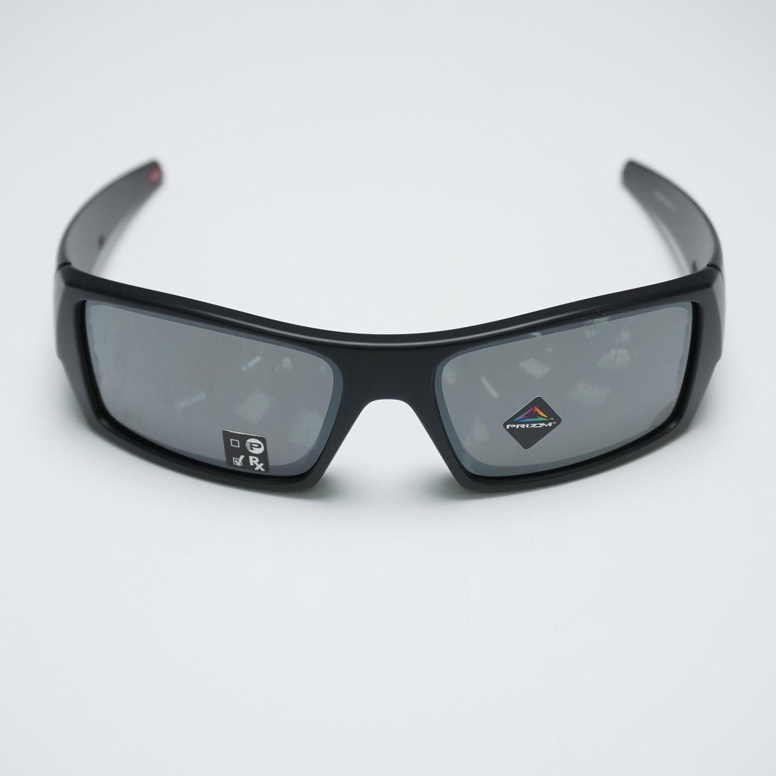 Oakley Gascan Philadelphia Eagles Sunglasses: Oakley Gascan sunglasses featuring the official Philadelphia Eagles logo on the temple, designed with a custom green-and-silver stripe pattern. The wraparound black frame is fitted with Oakley's signa