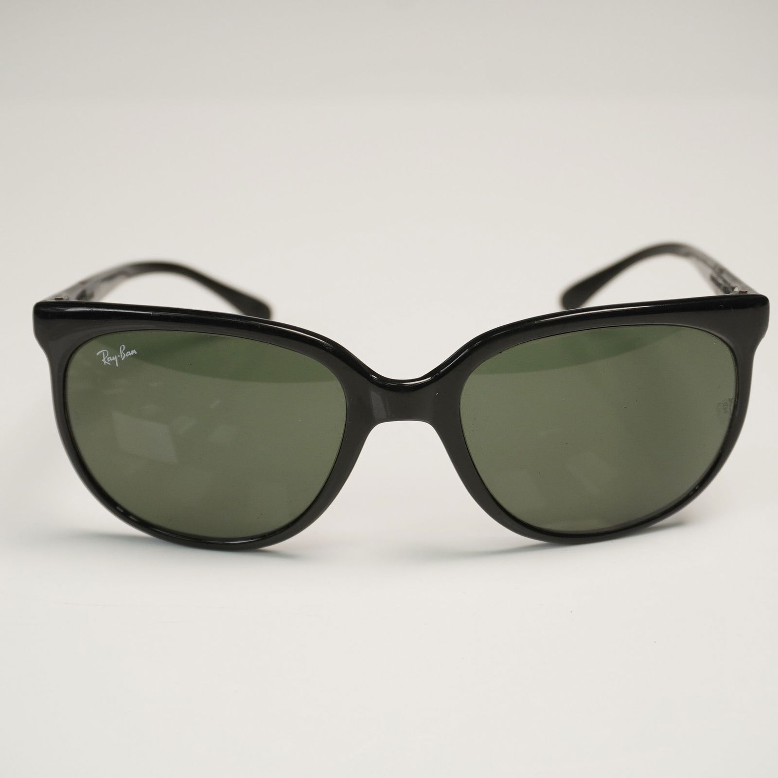 Vintage Ray-Ban Bausch & Lomb ORAS Sunglasses: Vintage Ray-Ban sunglasses from the Bausch & Lomb era, featuring classic green G-15 lenses etched with BL on each side, an exclusive mark of Ray-Bans produced before the brand's 1999 acquisition by Lu