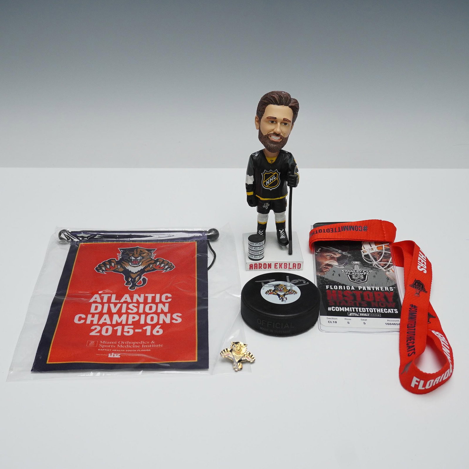 5pc Florida Panthers Aaron Ekblad and Tomas Vokoun Memorabilia Set: This 5-piece Florida Panthers memorabilia collection includes items honoring standout players from different eras of the team. Featured is a bobblehead figure of defenseman Aaron Ekblad in NHL All-Sta