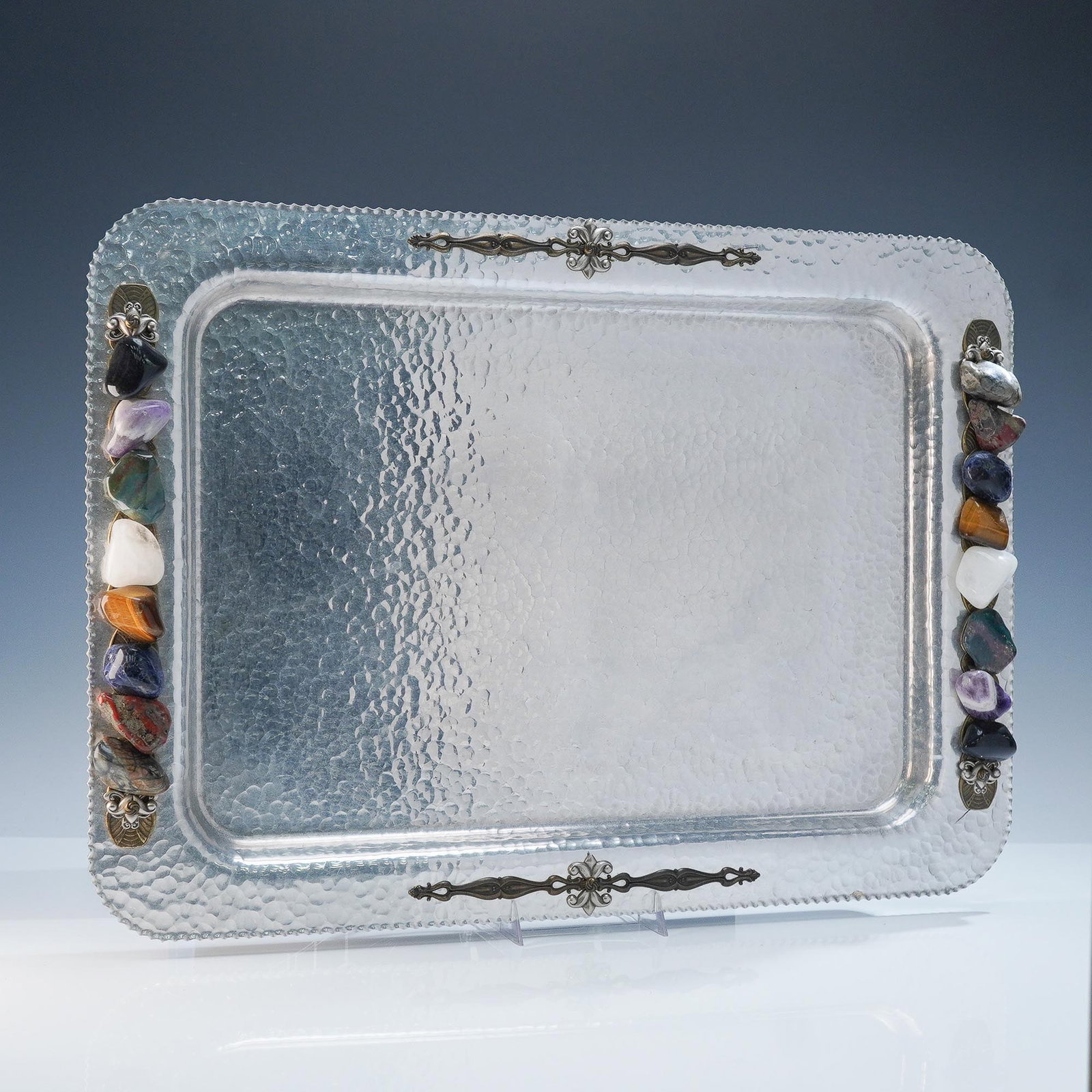 Rodney Kent Hammered Aluminum Tray with Ann Cichon Gemstone Accents: Large rectangular hammered aluminum tray marked with the Rodney Kent company's shield crest and style number 412. The piece features applied metal flourishes along the upper and lower borders and is a