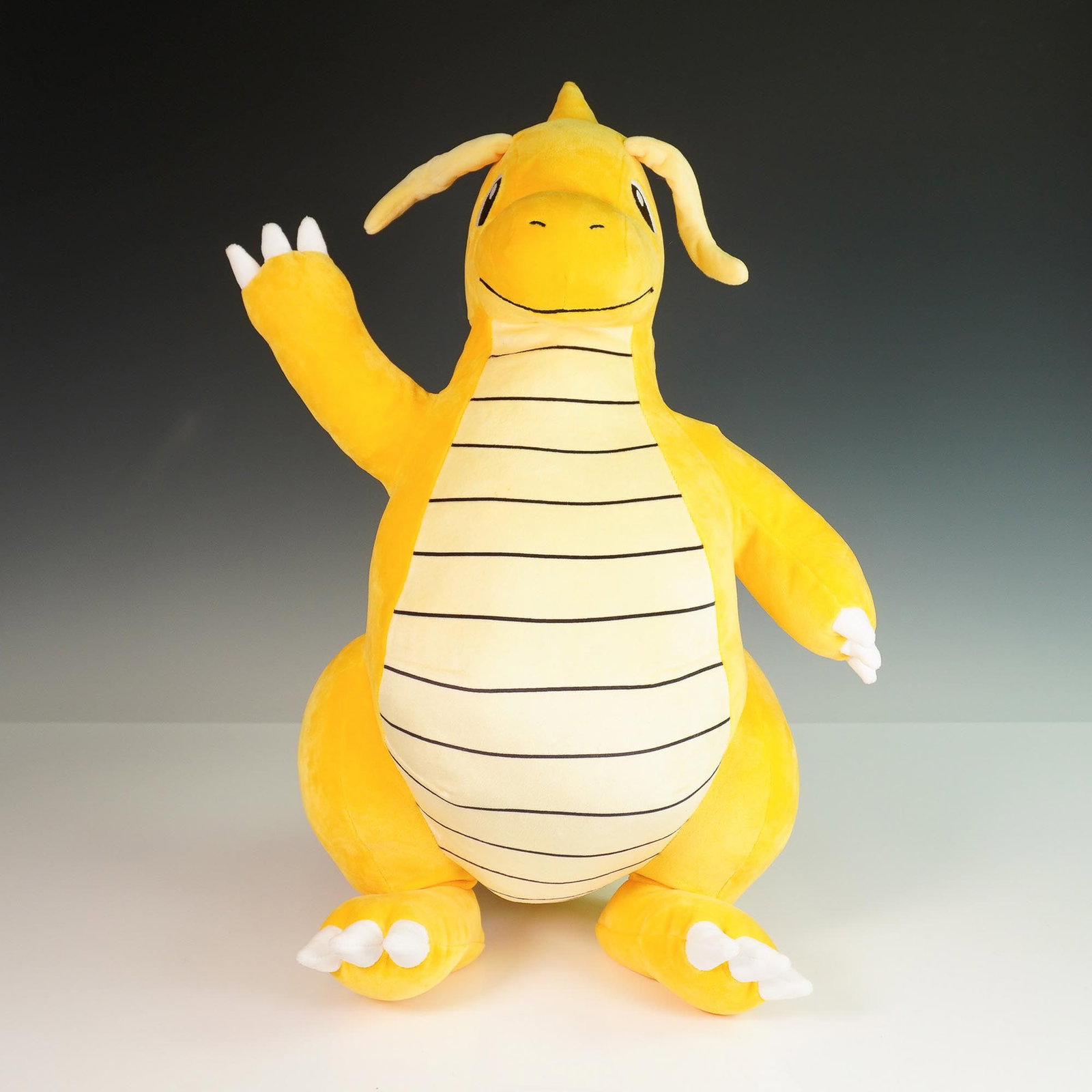 Pokemon Plush Toy, Dragonite: Large plush toy of Dragonite, the beloved Dragon/Flying-type Pokemon from the original Kanto region, officially licensed by Pokemon Company International. This soft, huggable plush features Dragonite'