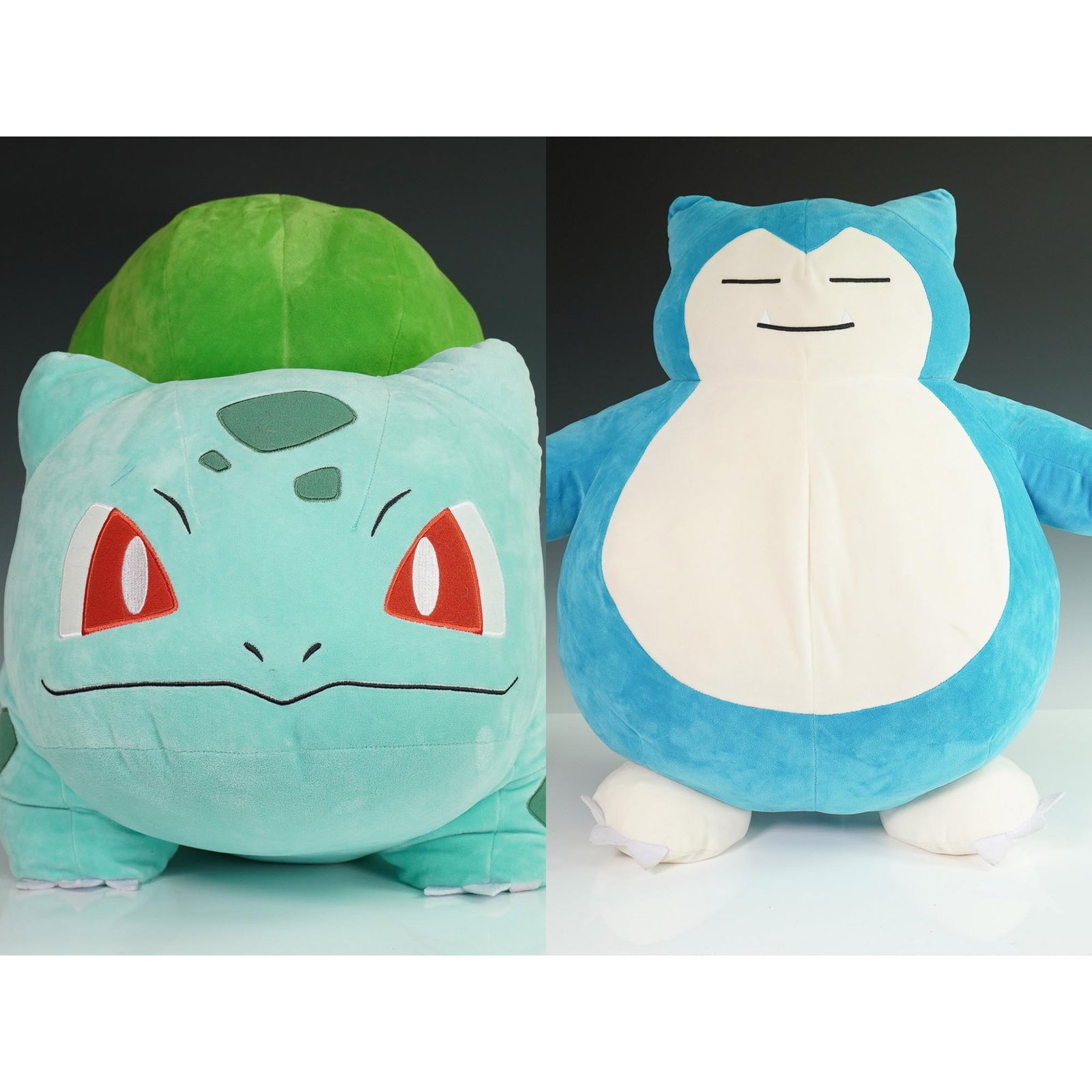 2pc Pokemon Plush Lot, Bulbasaur and Snorlax: Two large Pokemon plush figures including Bulbasaur and Snorlax, both crafted with soft fabric and detailed embroidered features. Bulbasaur is depicted in a crouched pose with a bright green bulb on i