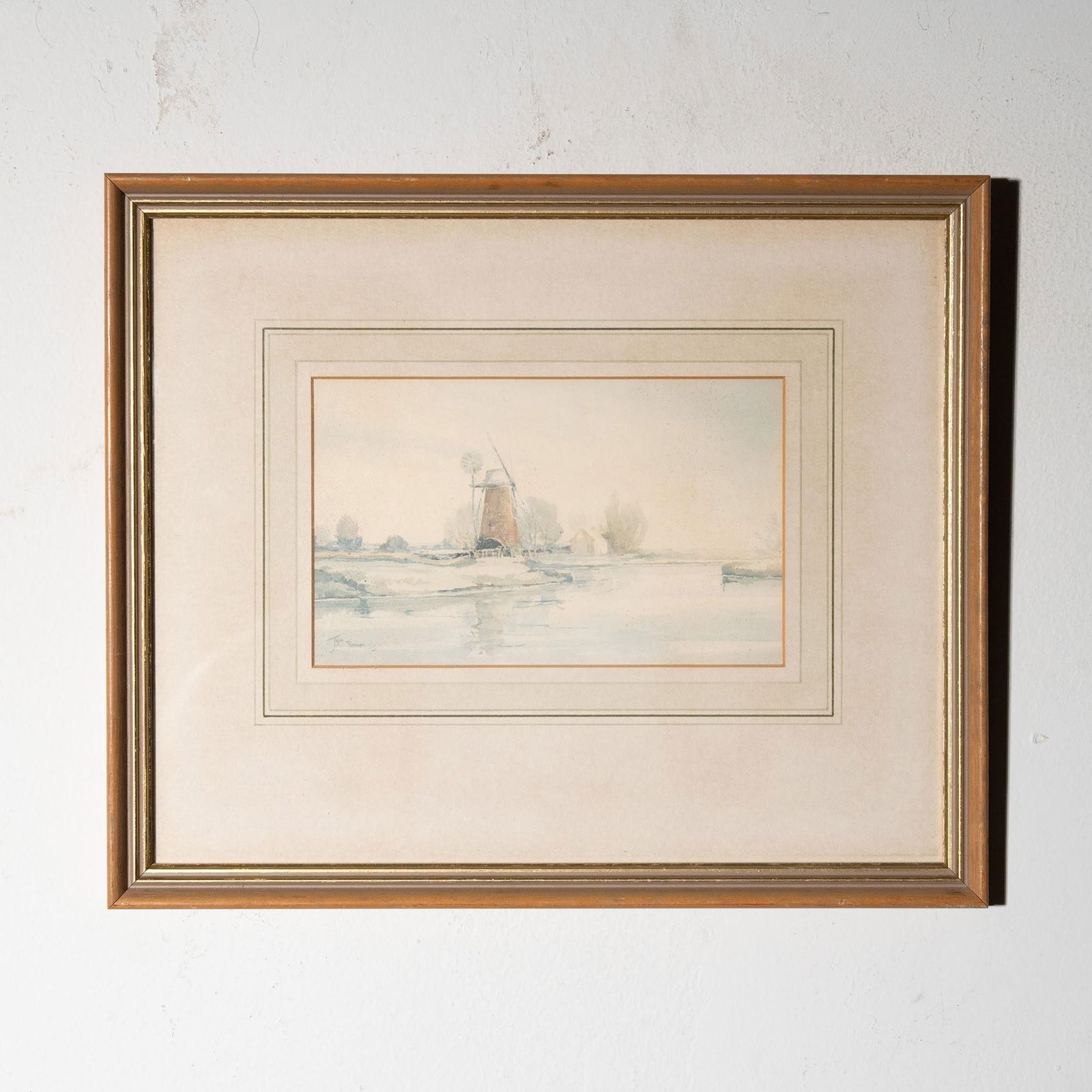 Jason Partner Watercolor Reproduction, Mill on the Ant Norfolk: This framed print, titled Mill on the Ant Norfolk, is a reproduction of an original watercolor by Jason Partner, L.S.A. The artwork captures a peaceful riverside scene featuring a traditional windmill