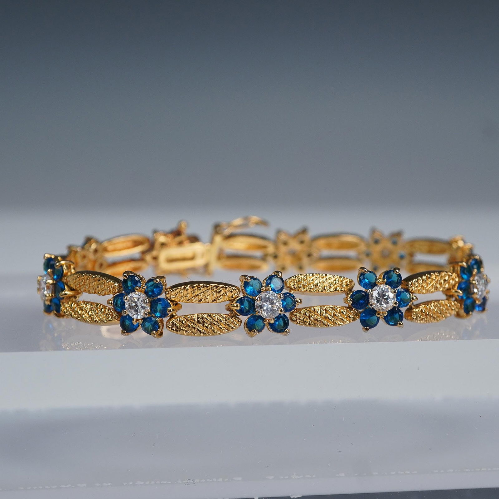925 Gold Tone Floral Link Bracelet with Blue and Clear Stones (1 of 6)