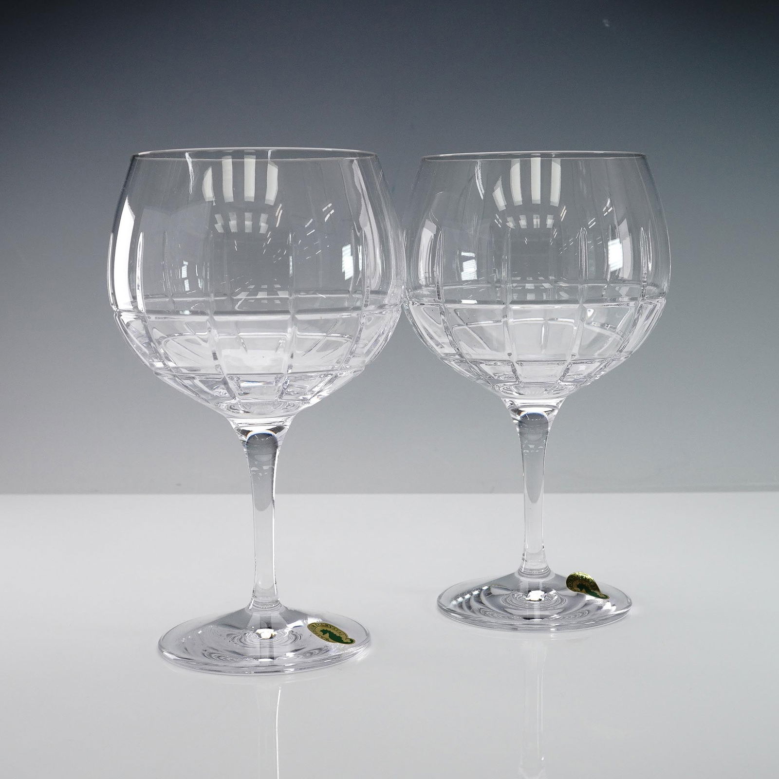 2pc Waterford Crystal Gin Journeys Balloon Goblets, Cluin: This elegant 2 piece set features Waterford Crystal gin balloon glasses from the Gin Journeys Collection, designed in the refined Cluin pattern characterized by clean lines and a distinctive crosshatc