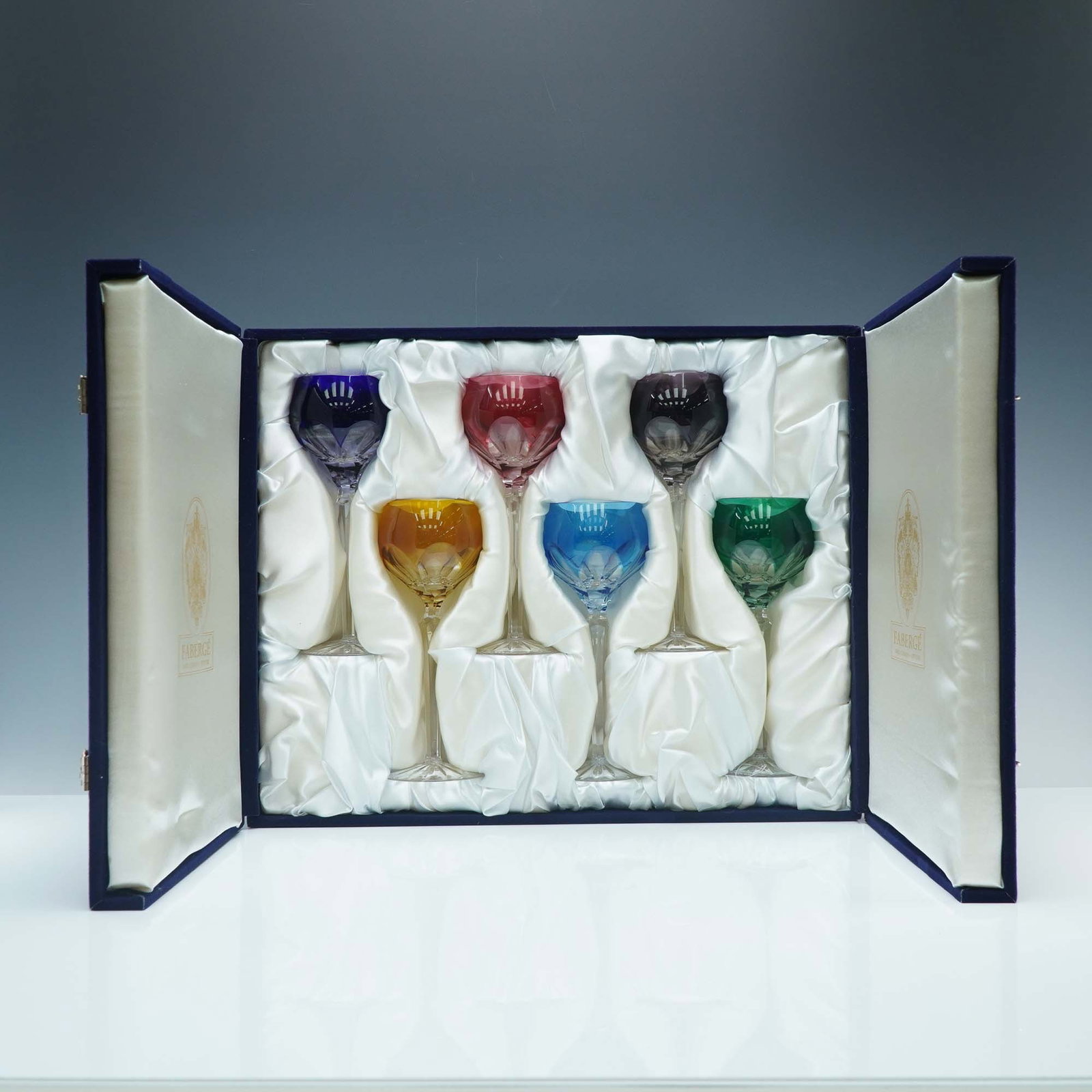 Set of 6 Imperial Faberge Crystal Wine Glasses: An exceptional set of six crystal wine glasses from the renowned Faberge Imperial Collection, each meticulously crafted to capture the elegance and grandeur of the Faberge legacy. This set includes gl