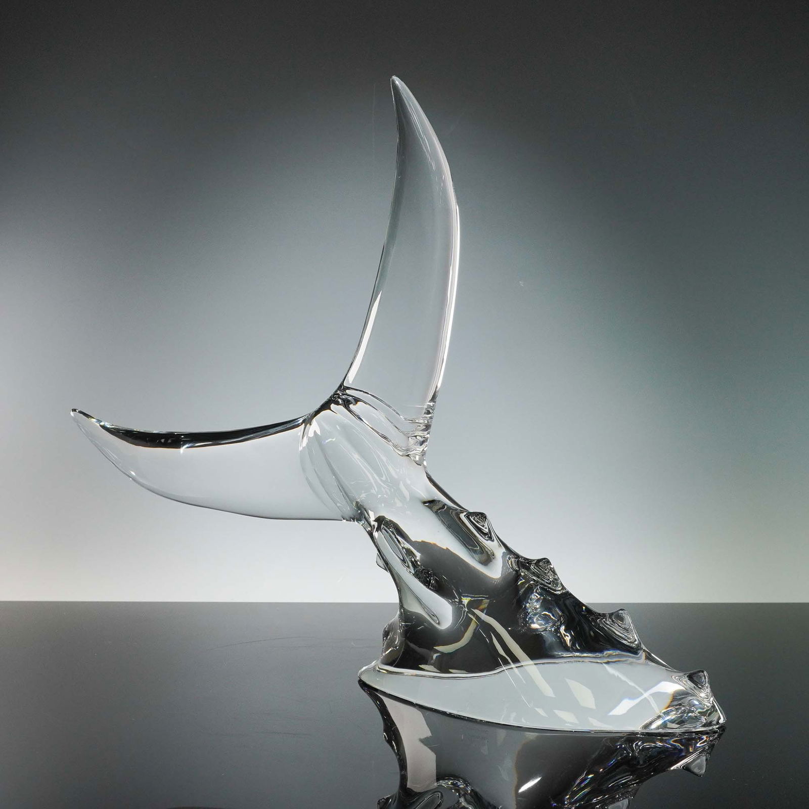Baccarat by Roberto Sambonet Large Tuna Tail Sculpture: Clear crystal sculpture by Baccarat, designed by architect and designer Roberto Sambonet (Italian, 1924-1995). The composition depicts the arched tail of a tuna rising from stylized ocean waves, execu