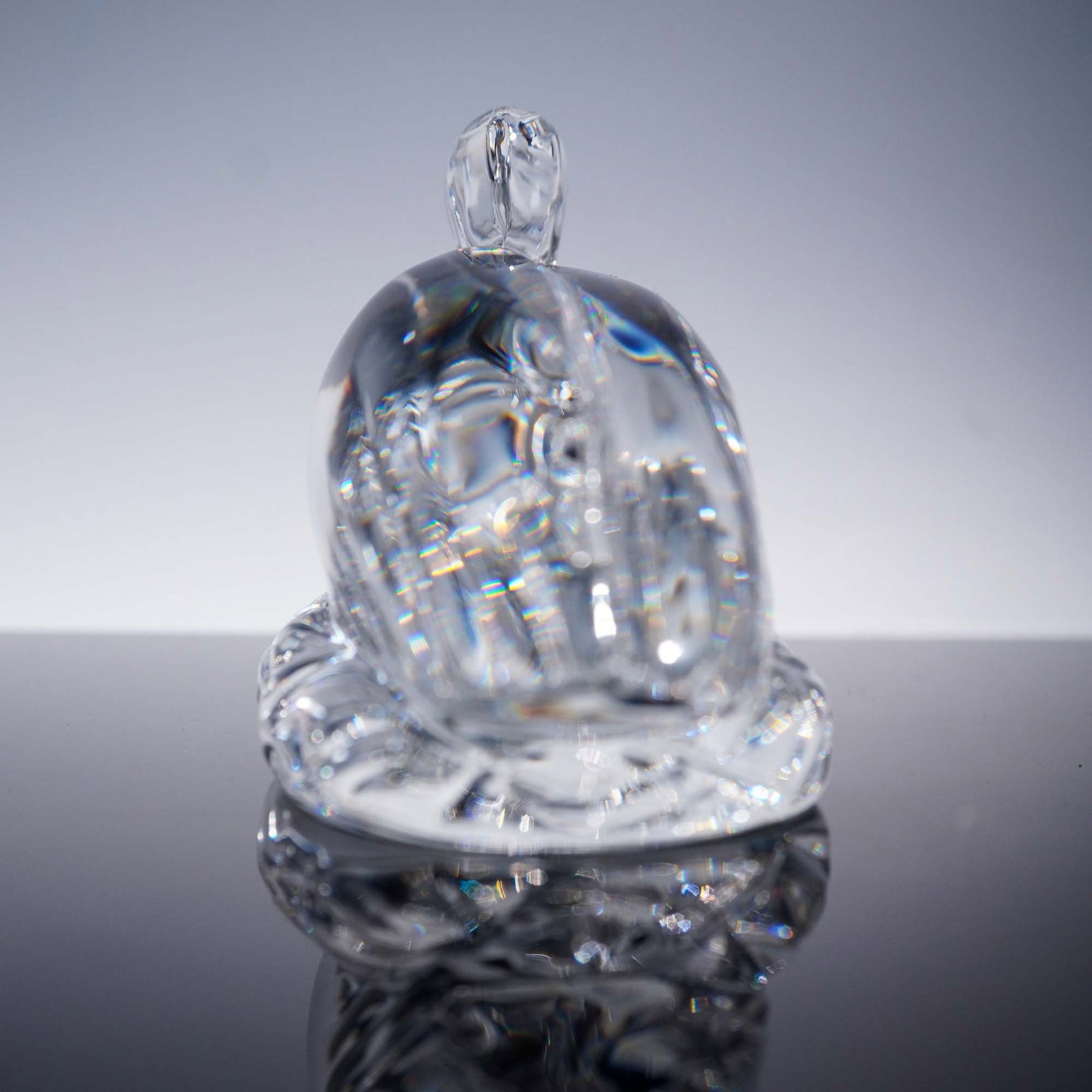Baccarat Crystal Figurine, Stork Cigogne: A clear crystal figurine depicting a stork in resting position, nesting. Made with detailed lining of feathers with highly detailed nest. Baccarat backstamp. Dimensions: 5.25"L x 2"W x 3"H Country of 