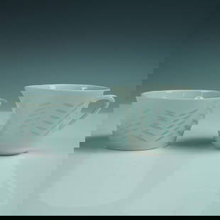 2pc Arabia Finland Rice Porcelain Set by Friedl Holzer-Kjellberg: Refined 2-piece rice porcelain cream and open sugar bowl set designed by Friedl Holzer-Kjellberg (1905"1993) for Arabia Finland. This mid-century set showcases Holzer-Kjellberg's signature technique o