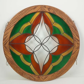 Round Stained Glass Window Panel with Geometric Floral Motif in Wood Frame